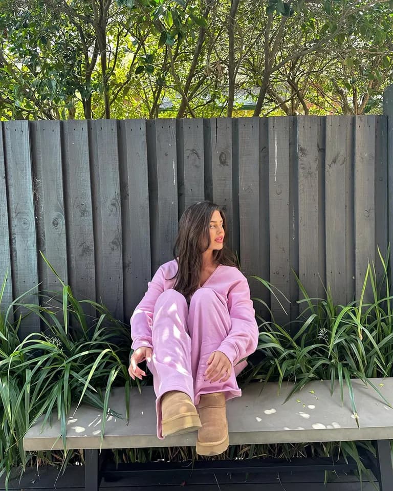 Lifestyle · Pink Sweatsuit Bench, example 4 of 4